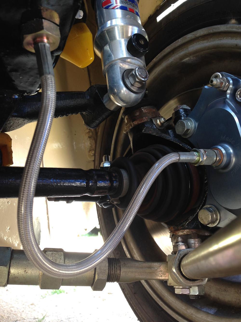 Goodridge brake hoses from subframe onto the brake caliper